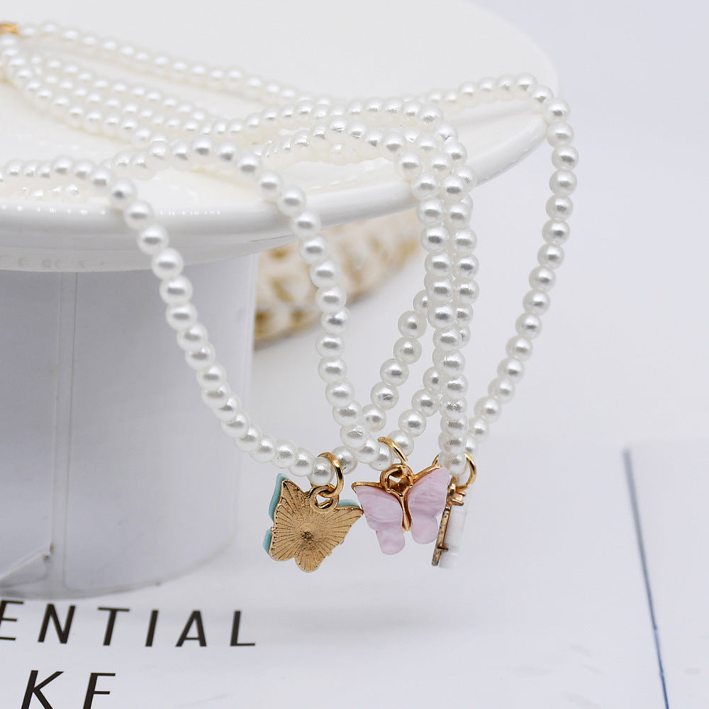 Elegant Pearl Butterfly Choker