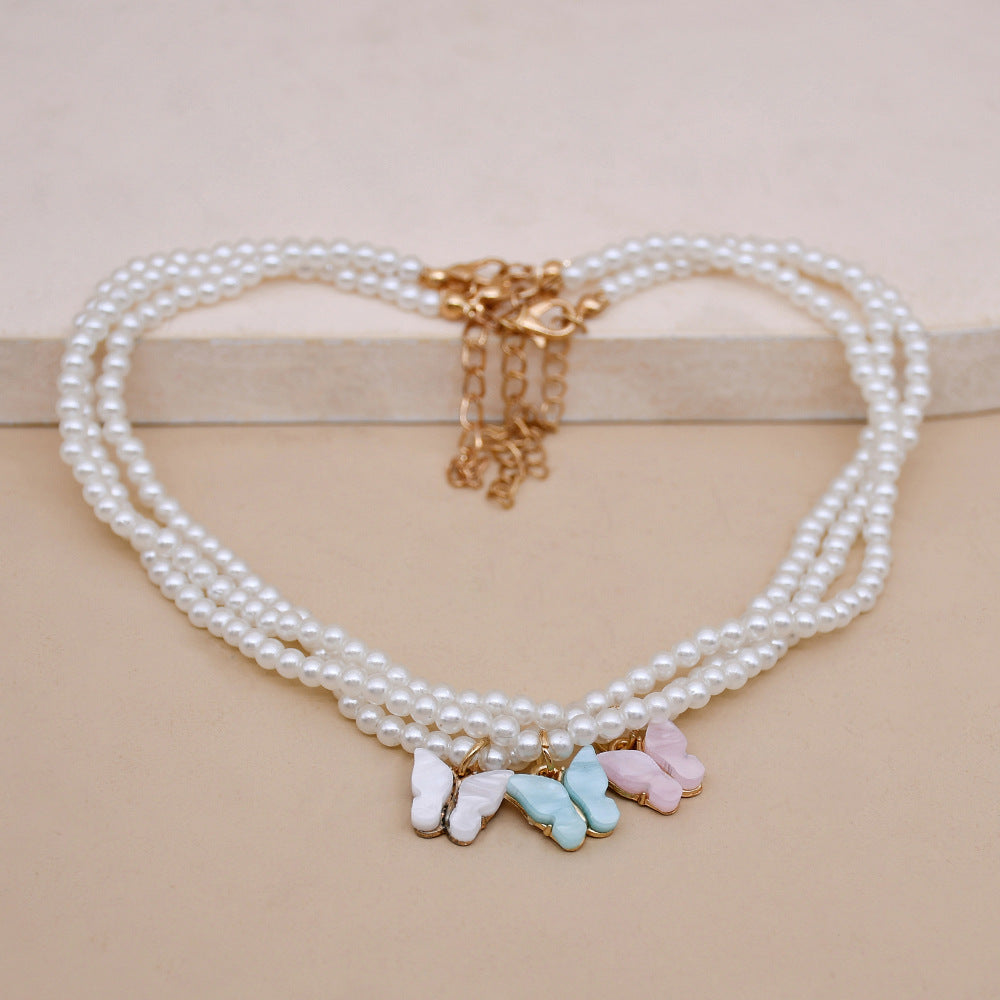 Elegant Pearl Butterfly Choker